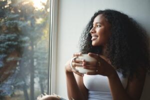 Woman enjoying coffee in the morning