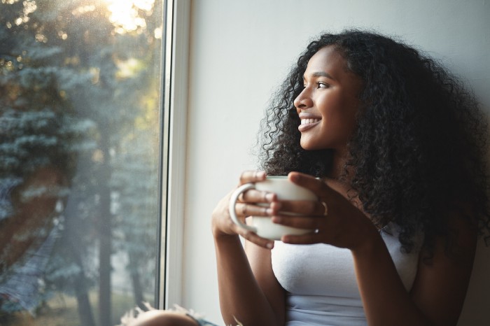 Woman enjoying coffee in the morning