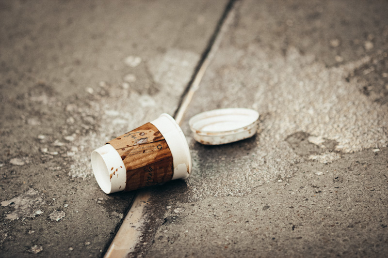 Spilled paper coffee cup