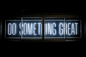 Neon sign reading, Do something great
