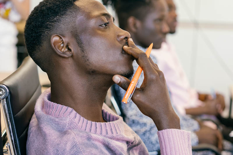 Young Black man thinking