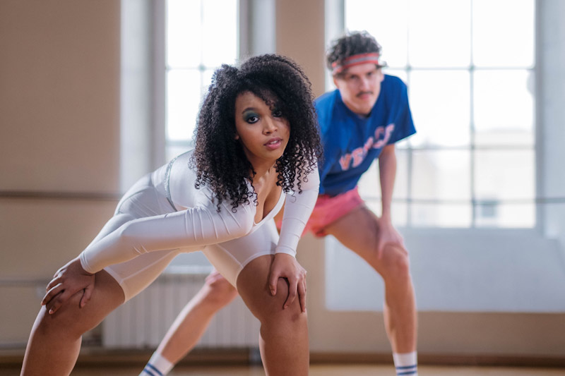 Woman and man doing jazzercise, sober