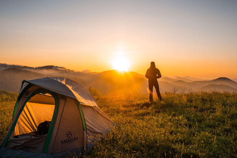 Man near a tent