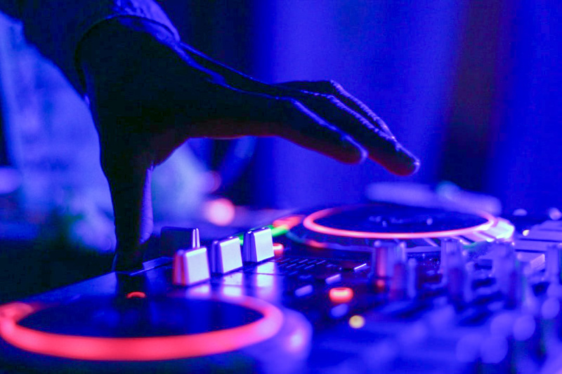 DJ's hand on turntables