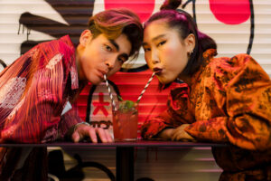 Man and woman sharing a nonalcoholic cocktail