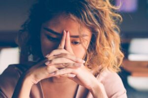 Woman concerned at work