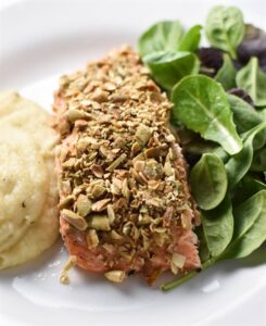 Pepita-crusted salmon