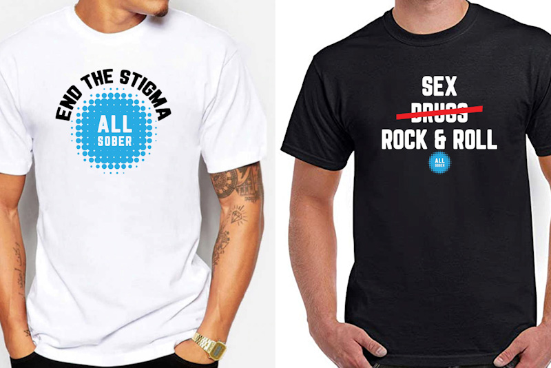 Two men wearing T-shirts with All Sober logos and designs