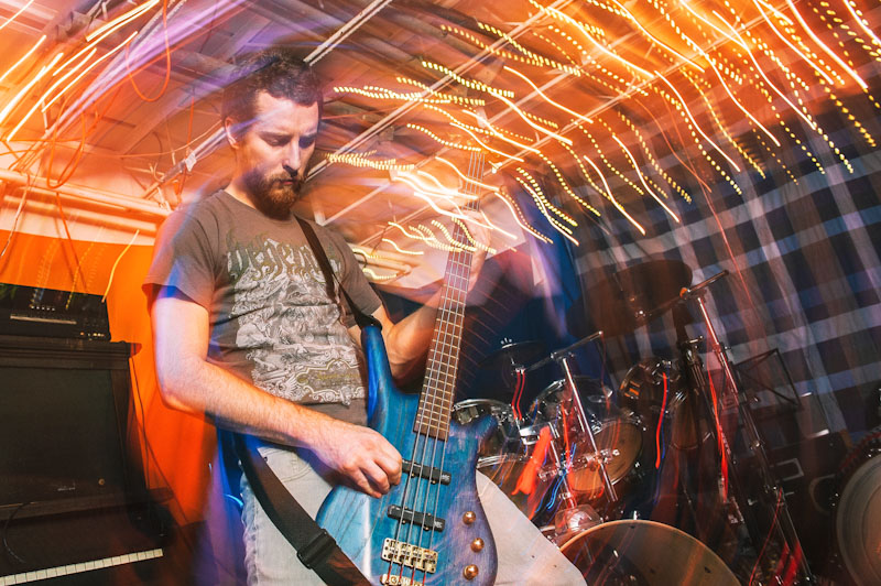 Man playing bass at a concert