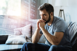 Man thinking about addiction and recovery