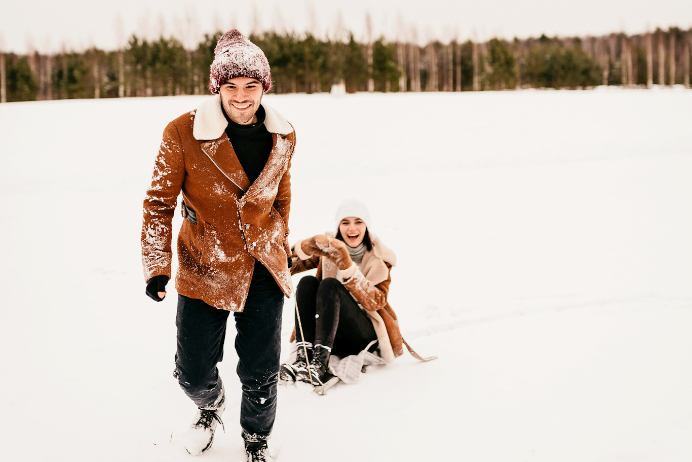 Sober couple sledding